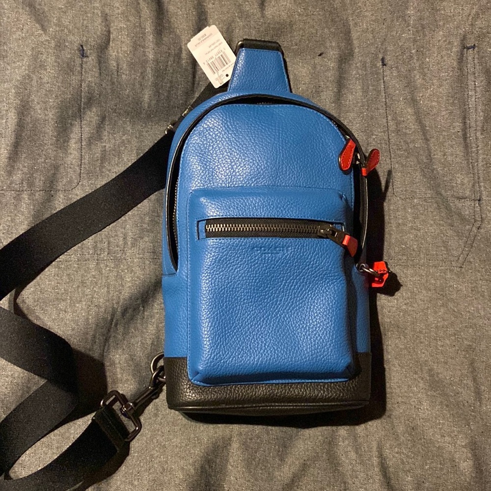 Coach mens westpack bag. Blue Jay/Miami Red. 7 3/4" (L) x 13" (H) x 3 1/4" (W)